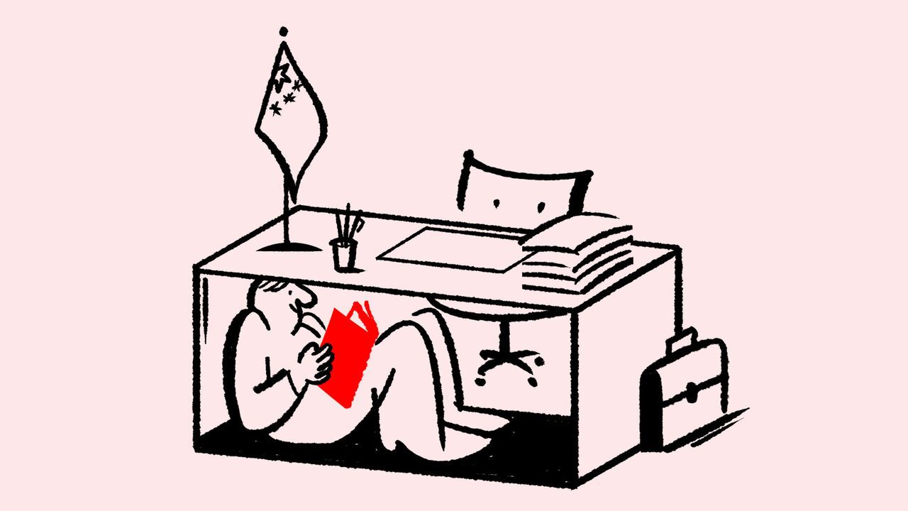 An illustration of a China official underneath their desk reading a book. There's a China flag on the desk along with documents and stationery.